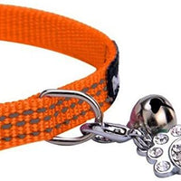 Collar de seguridad de nailon reflectante para gato, collar ajustable, con campanilla y y adorno de huella de la marca Bingpet - BESTMASCOTA.COM